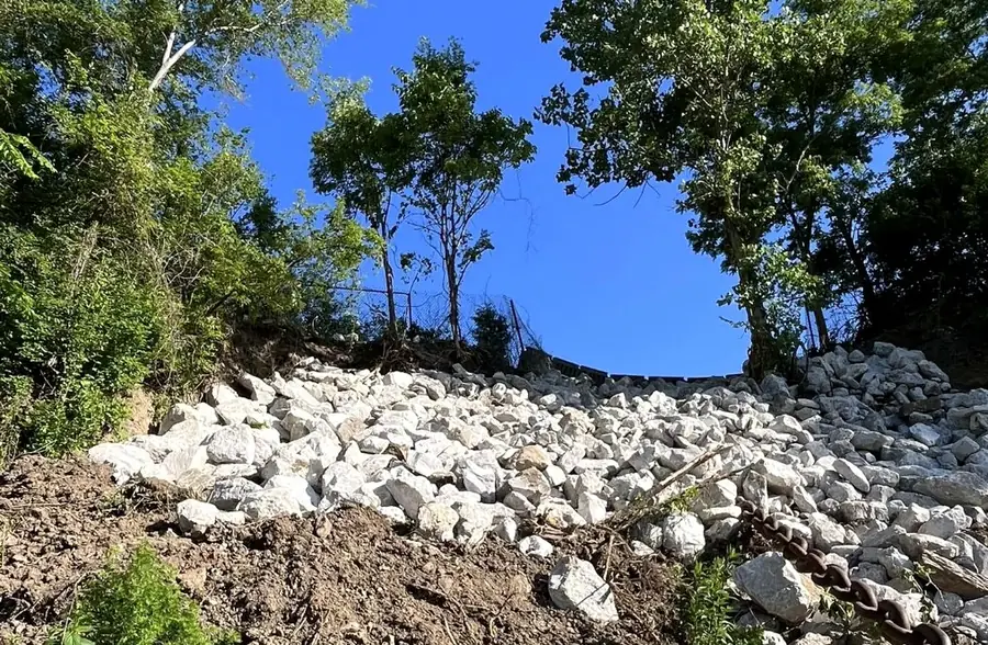 Clean rock fill placed on a cleared bank