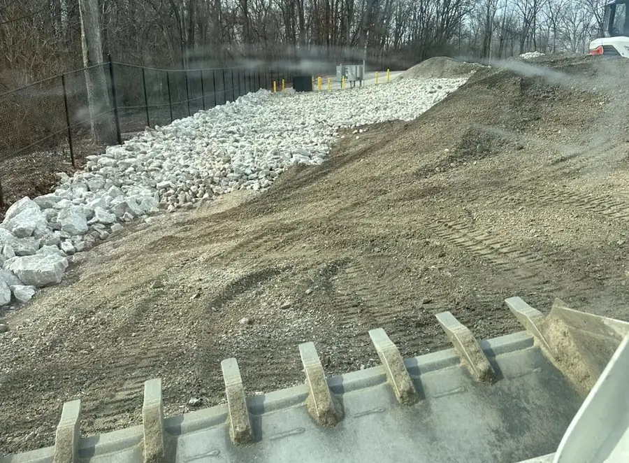 Stone stockpile and prepared subgrade
