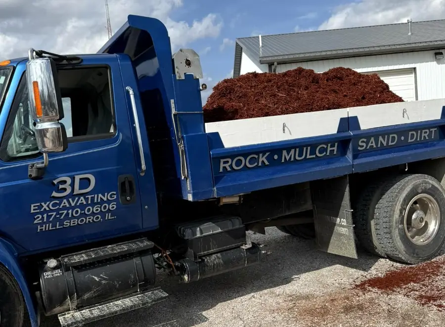 3D Excavating dump truck loaded with red mulch