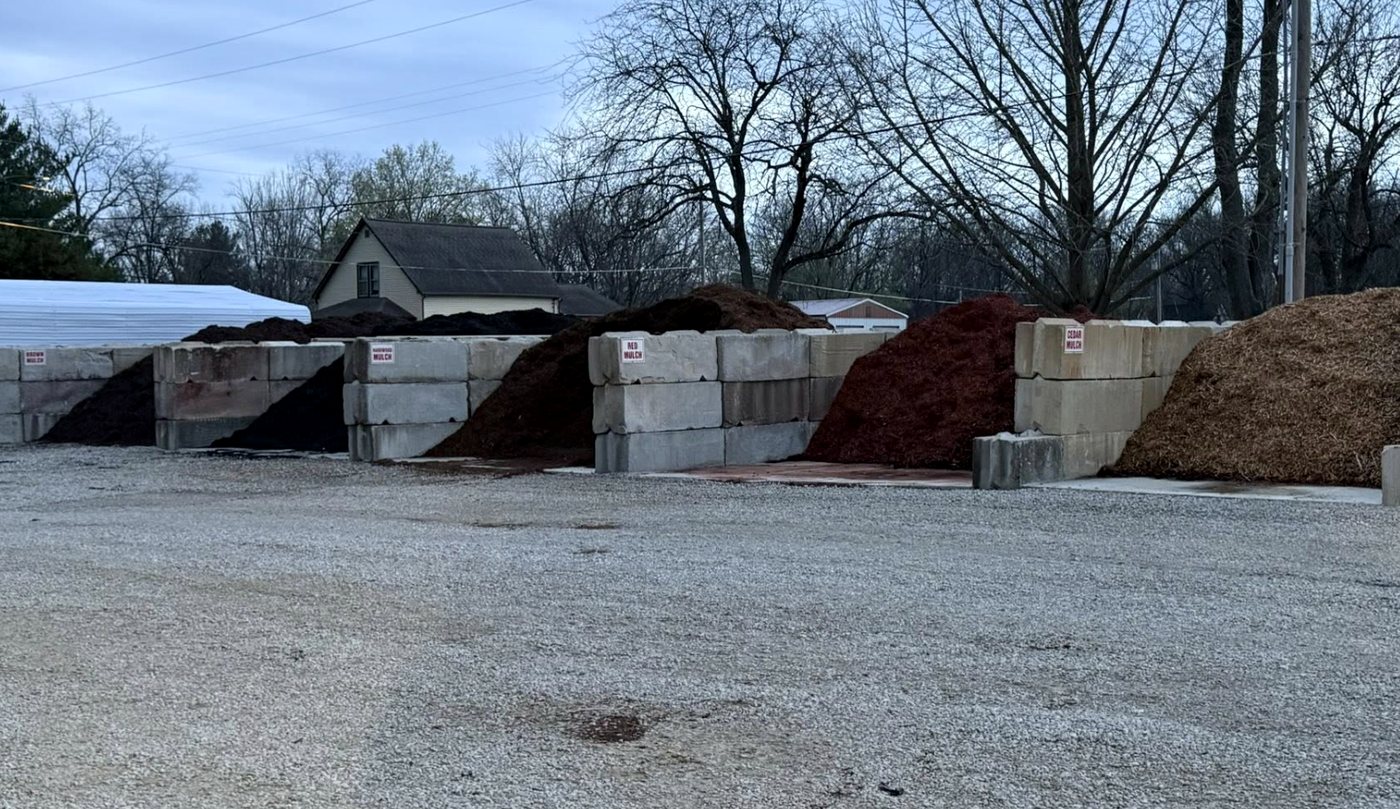 Rock, mulch and dirt bays at the yard